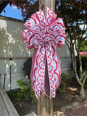 Red & White Decorative Bow with Light Blue Accents